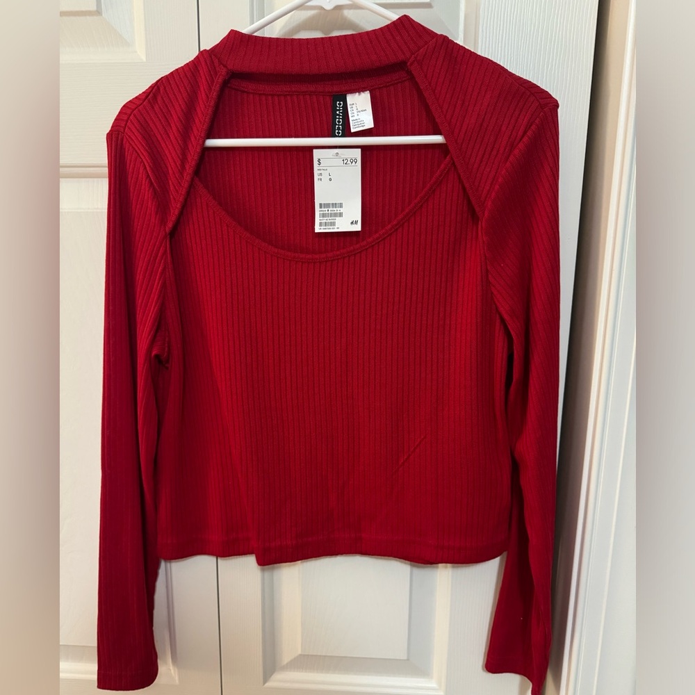 Red long sleeve shirt with cut out, size L